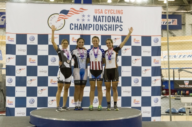 Jackie Crowell on top of the podium after winning the points race